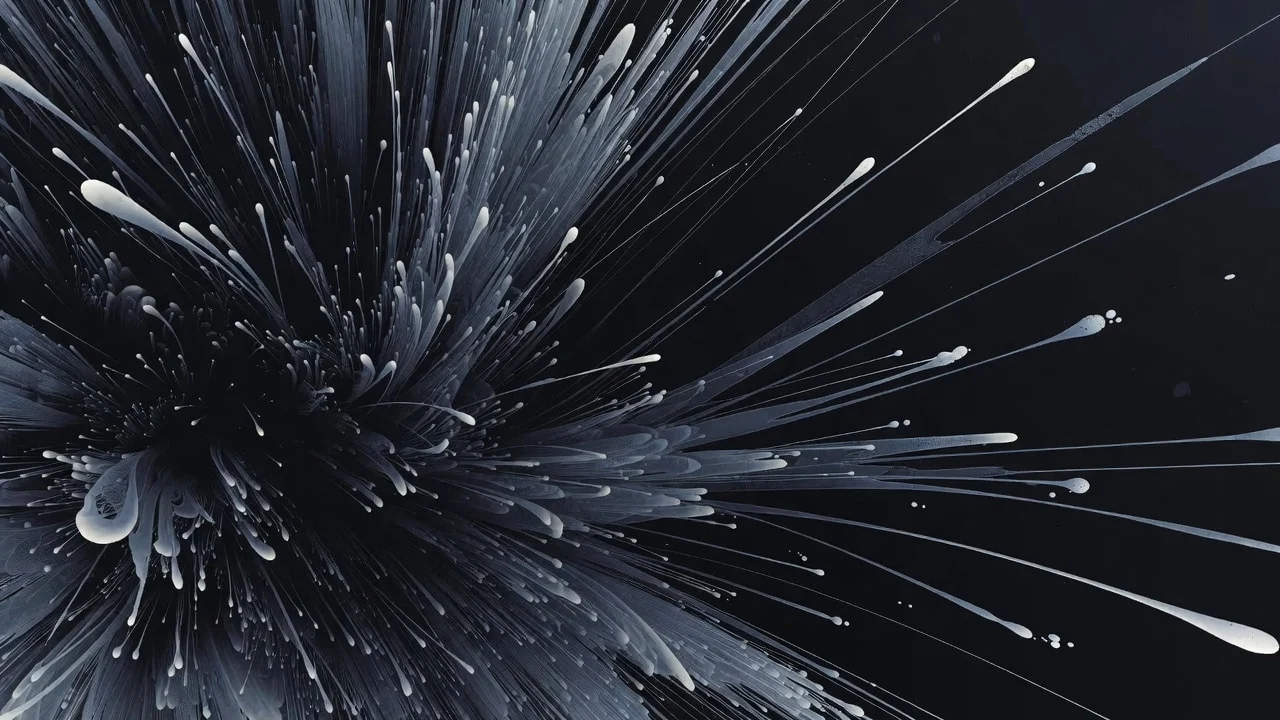 Abstrakti kuva: tumma keskusta, josta lähtee säteittäisiä, valkoisia ja harmaita viivoja ja pisaroita mustaa taustaa vasten.